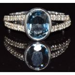 A 9ct white gold ring set with topaz, 3.9g, size M/N