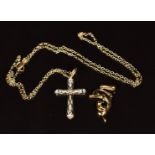 A 9ct gold dolphin pendant set with a sapphire and diamond, 9ct gold cross pendant set with a