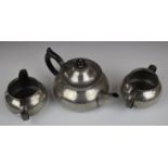 Liberty & Co. Tudric pewter Arts and Crafts or Art Nouveau three piece teaset with hammered