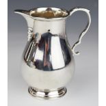 Walker & Hall Elizabeth II hallmarked silver jug, Birmingham, date letter rubbed, height 12cm,