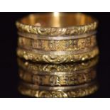 Georgian 18ct gold mourning ring with embossed borders and letters reading 'In memory of' , engraved