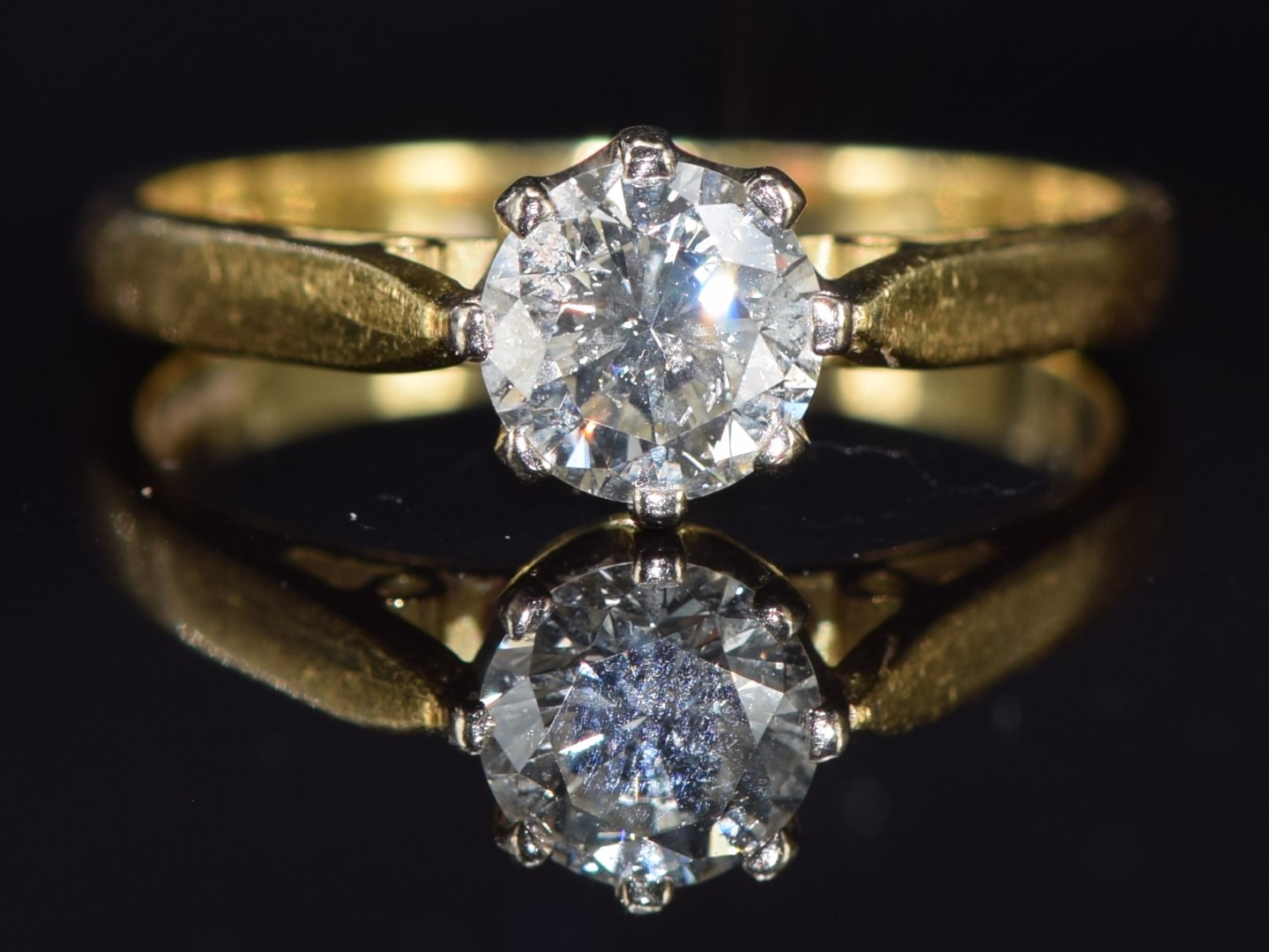 An 18ct gold ring set with a round cut diamond of approximately 1ct, 4.3g, size R - Image 2 of 3