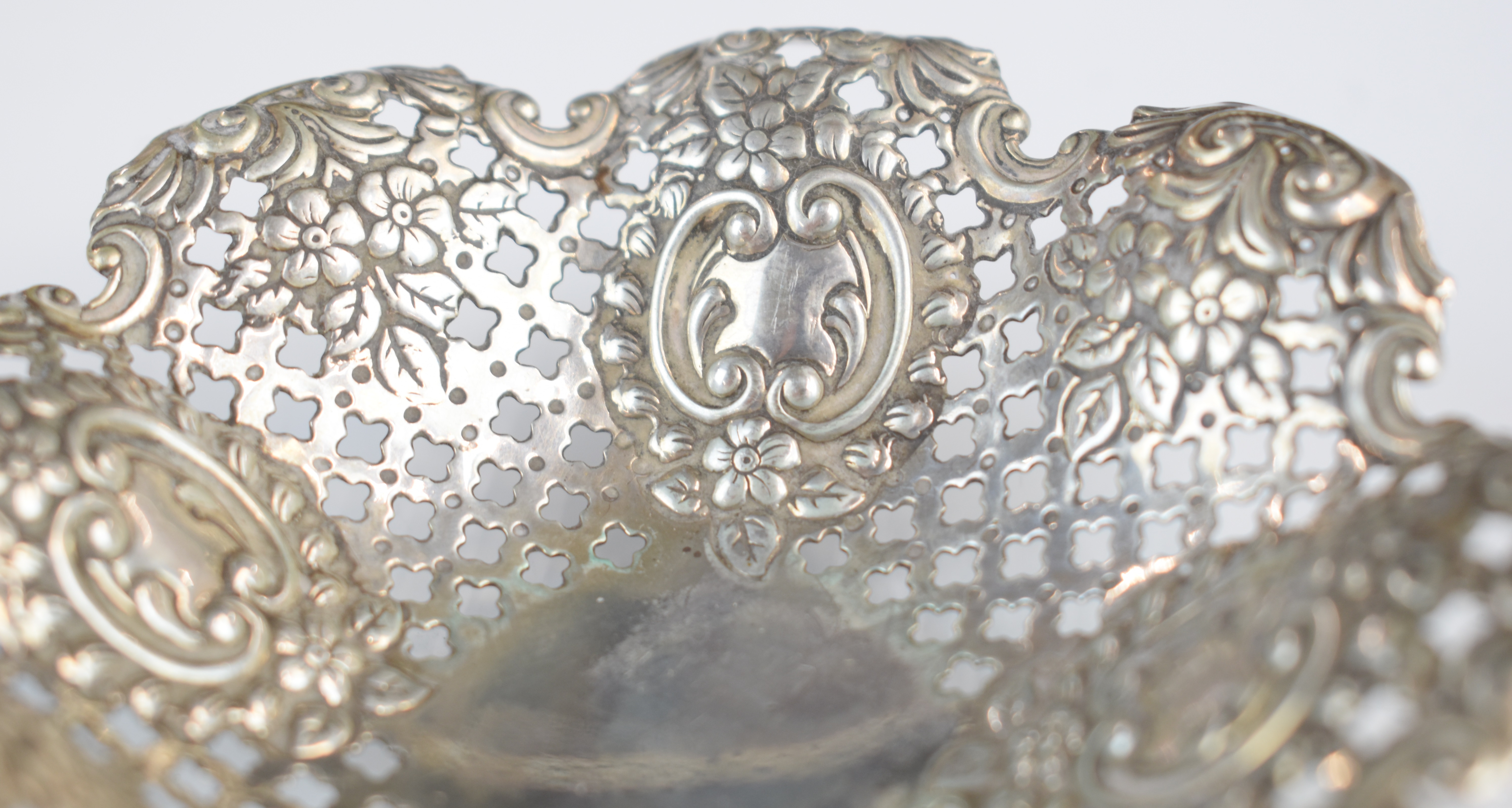 Two hallmarked silver bon bon dishes comprising Victorian pierced and embossed example, Sheffield - Image 3 of 7