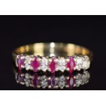 An 18ct gold ring set with rubies and diamonds, 2.9g, size O