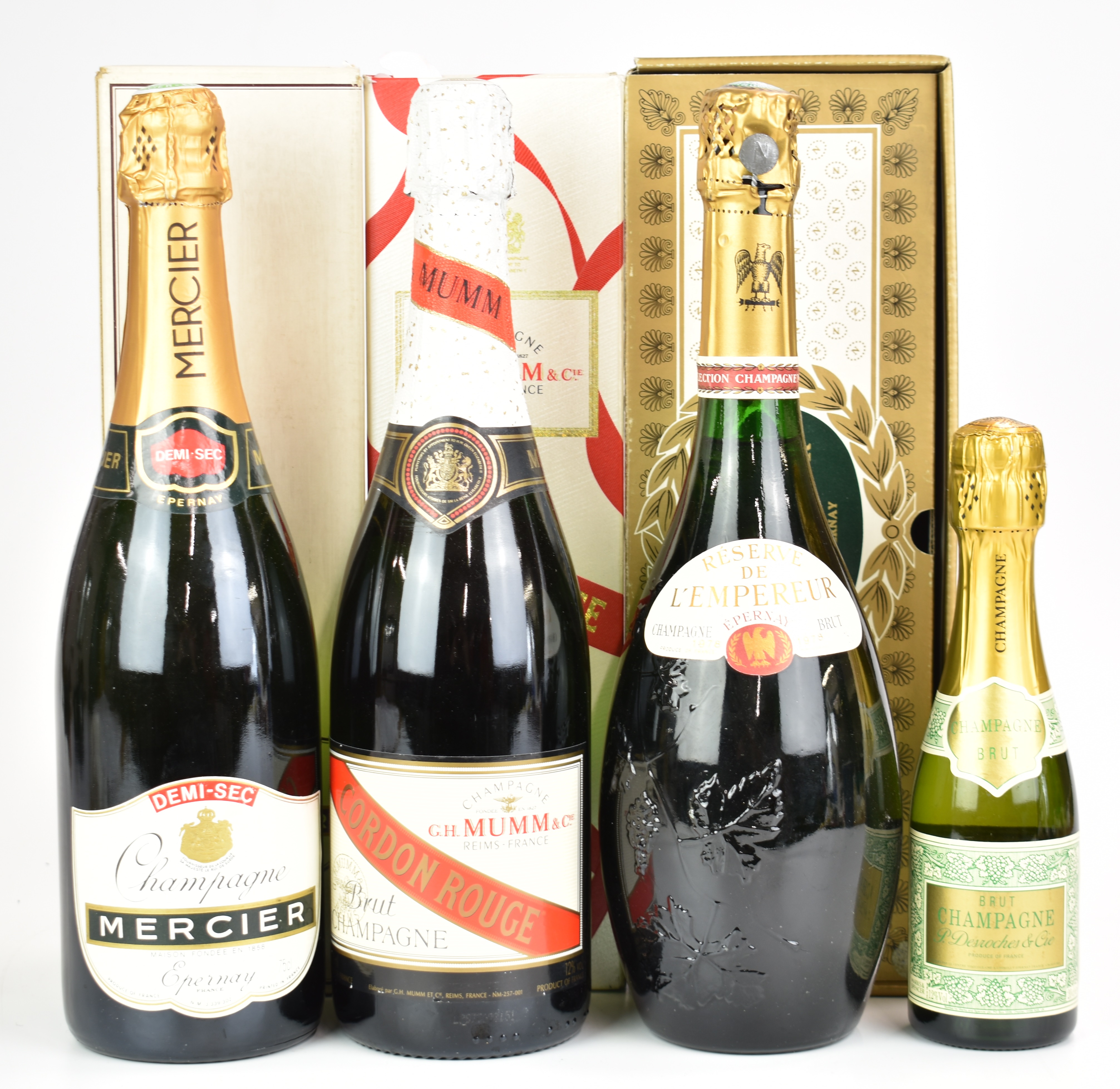 Four bottles of Champagne comprising Mumm, 75cl, 12%, Mercier 75cl and L'Empereur reserve, all boxed