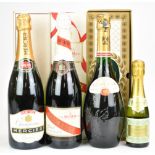 Four bottles of Champagne comprising Mumm, 75cl, 12%, Mercier 75cl and L'Empereur reserve, all boxed