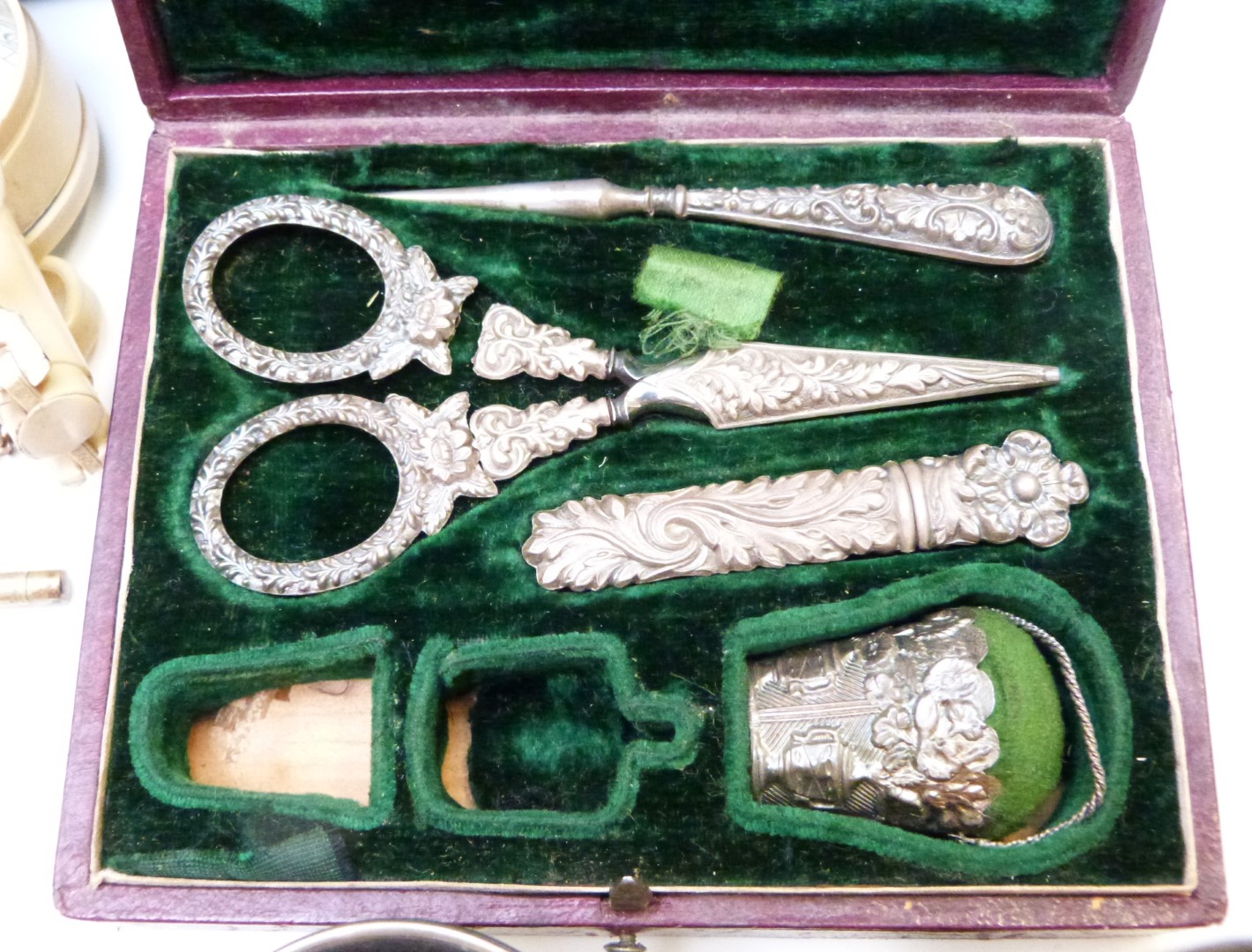 A collection of jewellery and silver including Egyptian glass pendant, coins, white metal sewing set - Image 5 of 9