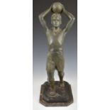 Spelter figure of a footballer taking a throw in, indistinctly marked to base, height 63cm