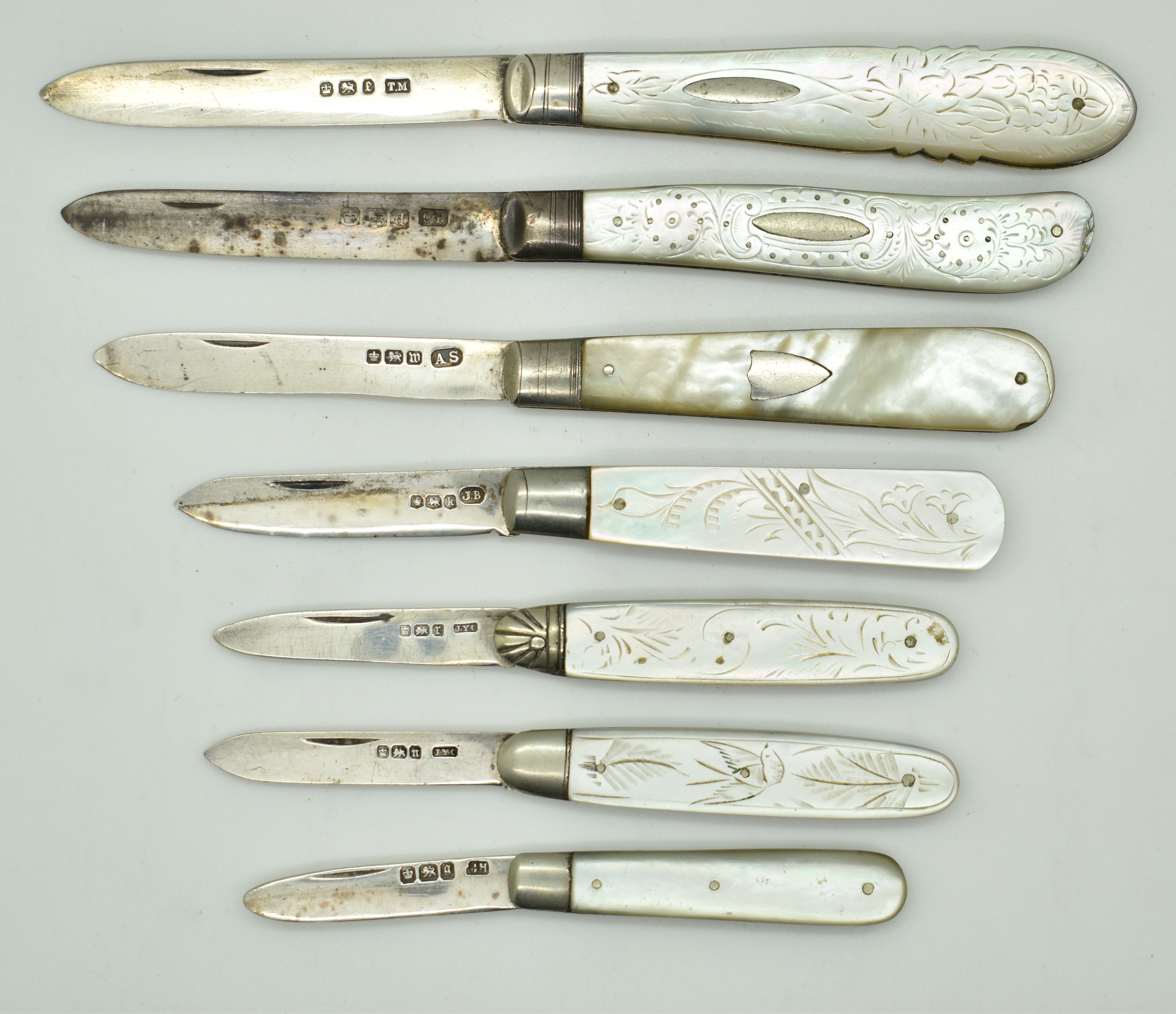 Seven Victorian and later hallmarked silver bladed mother of pearl folding fruit knives, length of