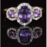 A 9k gold ring set with amethysts and diamonds, 1.9g, size Q