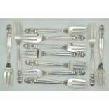 Set of eleven Georg Jensen silver acorn pattern cake forks, each marked Georg Jensen sterling