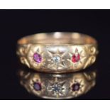 Edwardian 18ct gold ring set with a diamond and rubies in star settings, Birmingham 1909, 2.2g, size