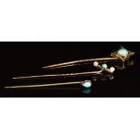 Edwardian 9ct gold stick pin set with a turquoise and seed pearls and two 9ct gold stick pins set