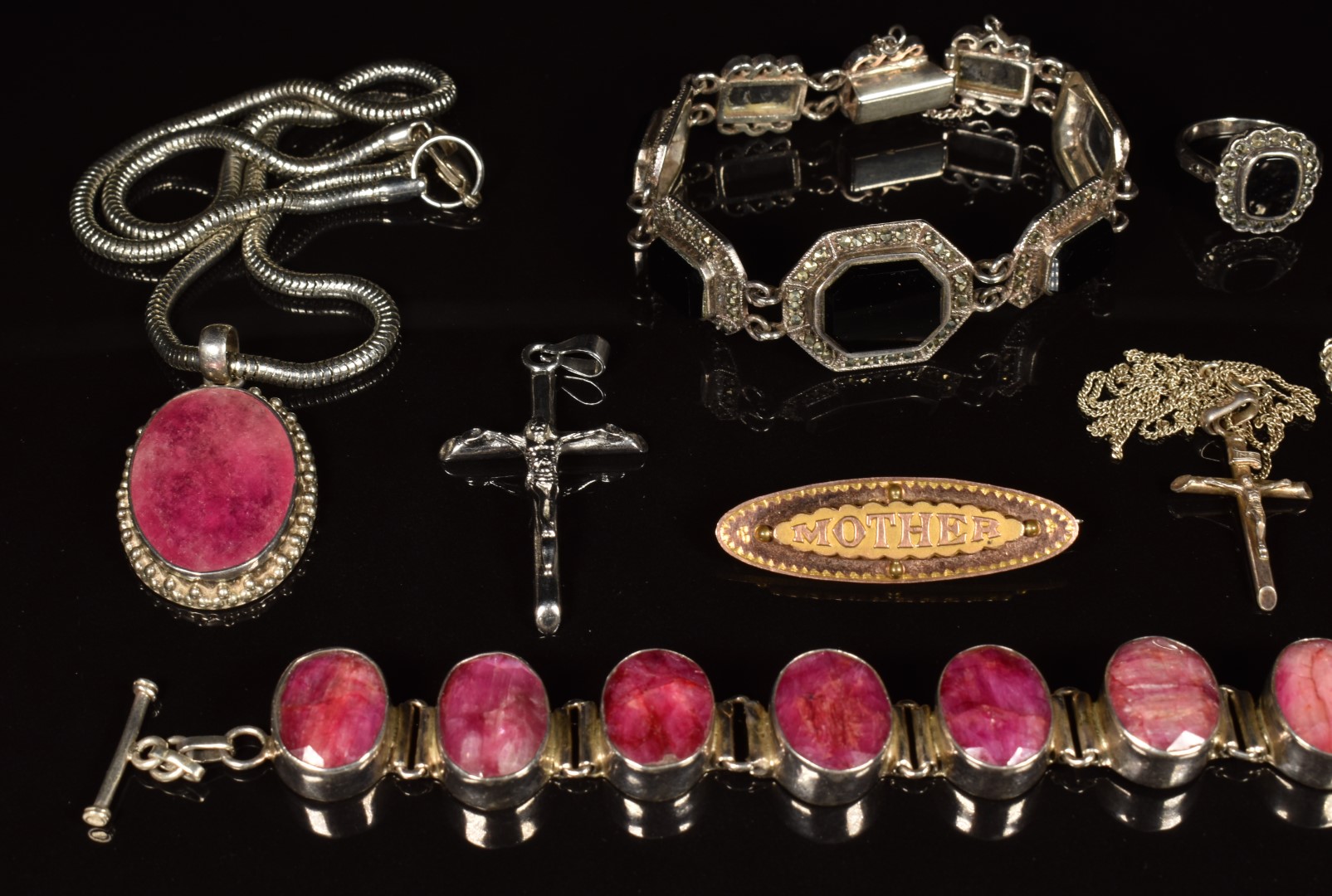 A silver bracelet set with rubies, a silver bracelet set with onyx, silver pendants and chains, - Image 2 of 3
