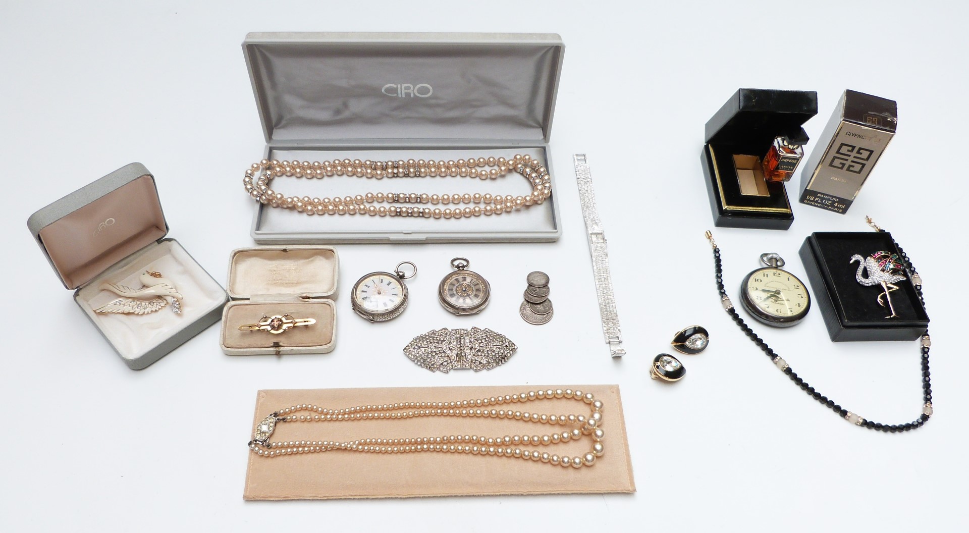 A collection of costume jewellery including 9ct gold brooch (2g), flamingo brooch, two silver fob