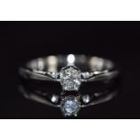 An 18ct white gold ring set with a diamond of approximately 0.22ct, 3.0g, size M/N