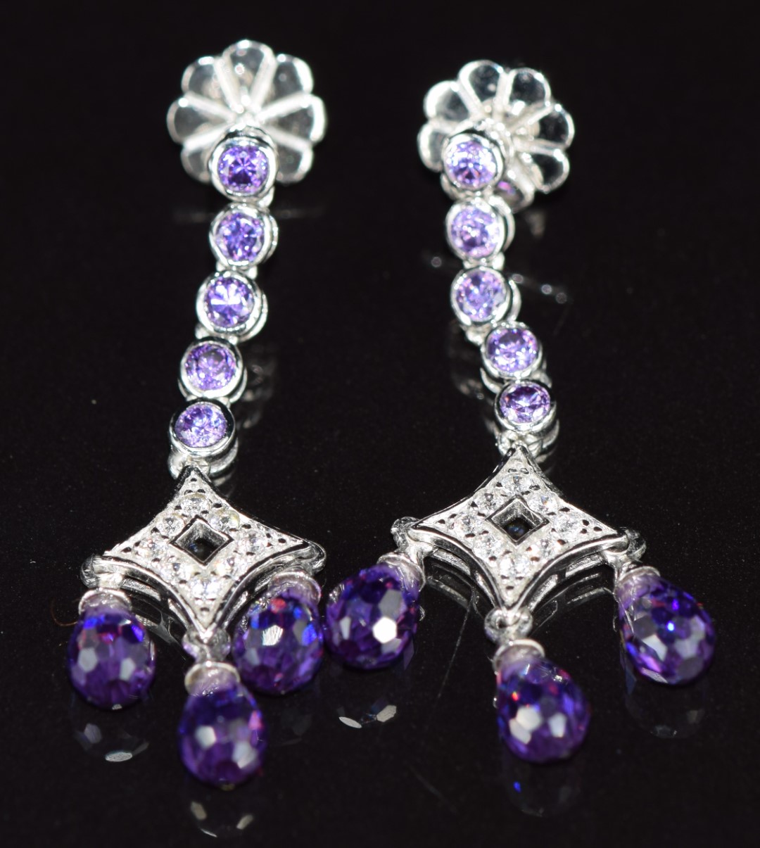 A pair of 14k white gold earrings set with cubic zirconia, 5g