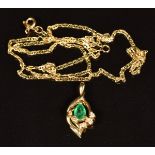 A 14k gold pendant set with a pear cut emerald and diamonds, on 14k gold chain, 2.8g