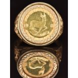 A 9ct gold ring set with a 1985 gold 1/10 Krugerrand, 7.9g, size T