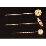 A 15ct gold stick pin set with a ruby (1.7g), 9ct gold Victorian stick pin set with a ruby and a 9ct