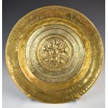 19thC Arts & Crafts brass charger with hammered decoration, diameter 41cm, on stand