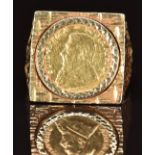 A 9ct gold ring set with a 1984 gold 1/10 Krugerrand, 9.9g, size S