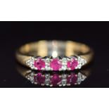 A 9ct gold rings set with rubies and diamonds, 2.6g, size T