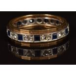 A 9ct gold eternity ring set with sapphires and spinel, 3.8g