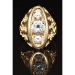 A 9ct gold ring set with three cubic zirconia, 10.2g, size X