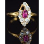 Victorian 18ct gold ring set with a pink sapphire cabochon and old cut diamonds (one diamond