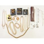 A collection of costume jewellery including Scottish silver bracelet, Hollywood pendant, silver