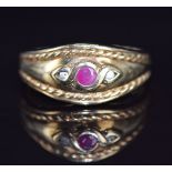 A 9ct gold ring set with a ruby and diamonds, 3.5g, size O/P