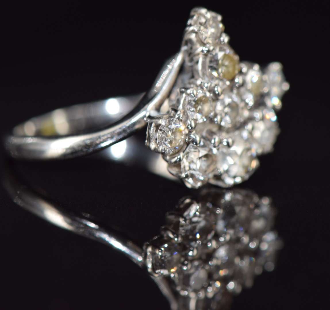 An 18ct white gold ring set with a cluster of old cut diamonds, largest 0.28ct, 4.6g, size N - Image 2 of 2