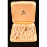 A single strand of cultured pearls with 9ct gold clasp and Ciro 9ct gold earrings set with a faux