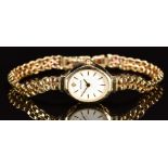 Accurist 9ct gold ladies wristwatch with gold hands and hour markers, white dial and quartz