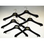 Six vintage Chanel velvet coat hangers with classic Chanel logo in gold. Consigned by an ex-employee