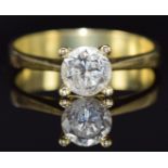 An 18k gold ring set with a round cut diamond of approximately 0.95ct, 4.3g, size P