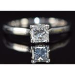 A platinum ring set with a princess cut diamond of approximately 0.5ct, 3.6g, size I/J
