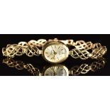 Unnamed 9ct gold ladies wristwatch with gold hands and baton hour markers, silver dial and quartz