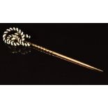 Victorian 9ct gold stick pin set with enamel in the form of a lover's knot, 4.6g