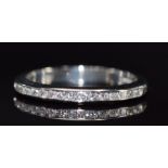 A platinum half eternity ring set with diamonds, 4.8g, size P