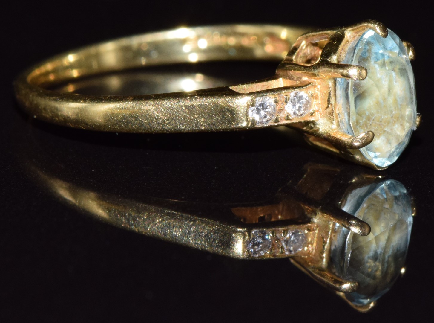 An 18ct gold ring set with an oval cut aquamarine and diamonds, 2.3g, size J - Image 2 of 2