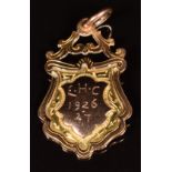 A 1920's 9ct gold fob / medallion awarded to Bretforton Football Club (near Evesham,