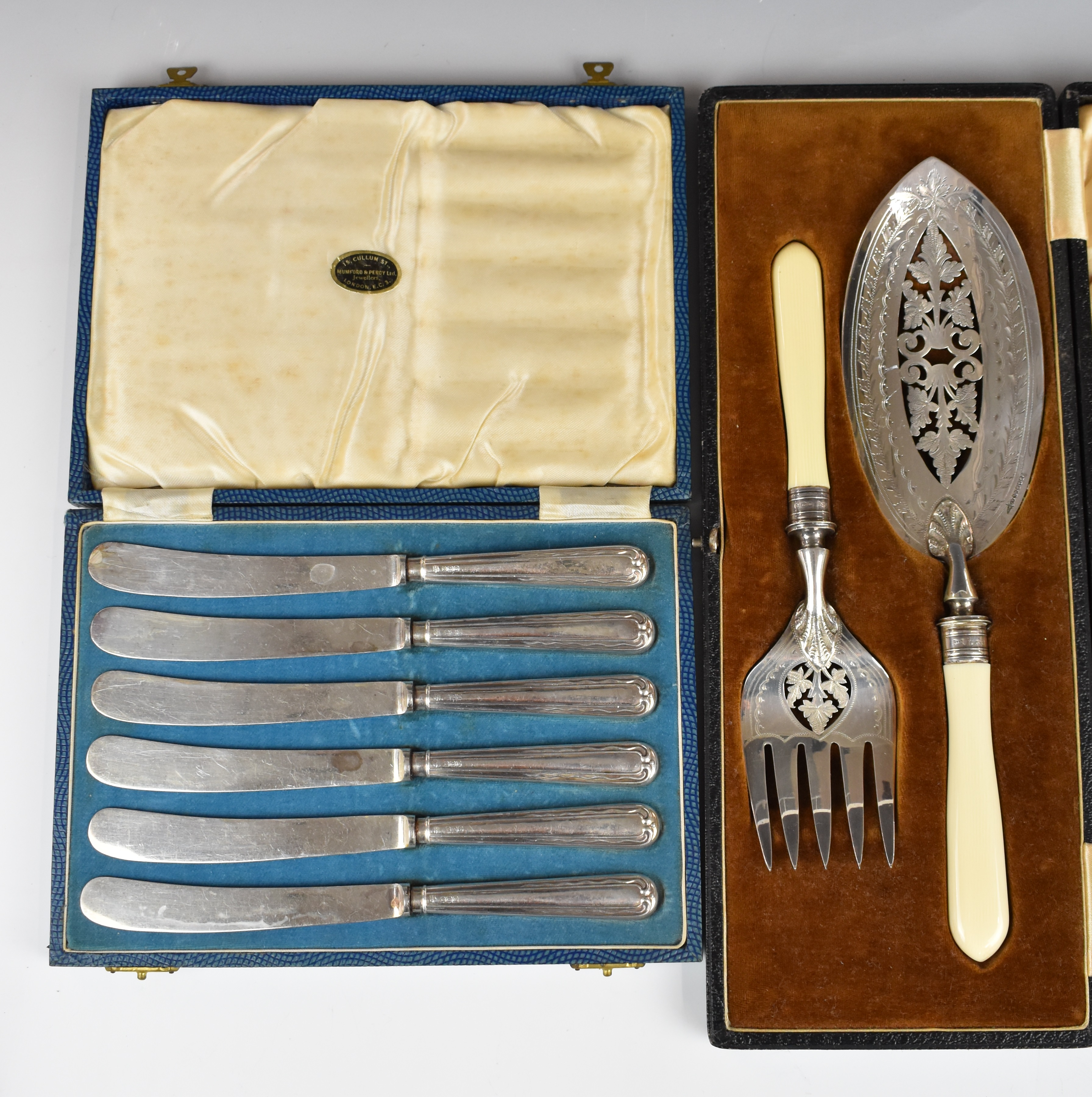 Cased set of hallmarked silver handled cake knives, together with a pair of Walker & Hall silver