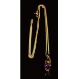 A 9ct gold pendant set with an oval cut amethyst and a diamond, on 9ct gold chain, 1.8g