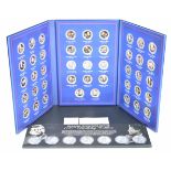 Windsor Mint two plated coin collections, one silver plated with gold overlay, the other gold plated