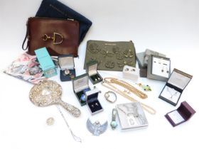 A collection of jewellery including lockets, Celtic silver earrings, £2 coin, silver mirror,
