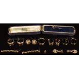 An 18ct gold ring (1.6g), five pairs of 9ct earrings (7.3g) and a 9ct gold stick pin in original box