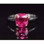 A platinum / 18ct white gold ring set with a synthetic ruby, 2.2g, size L