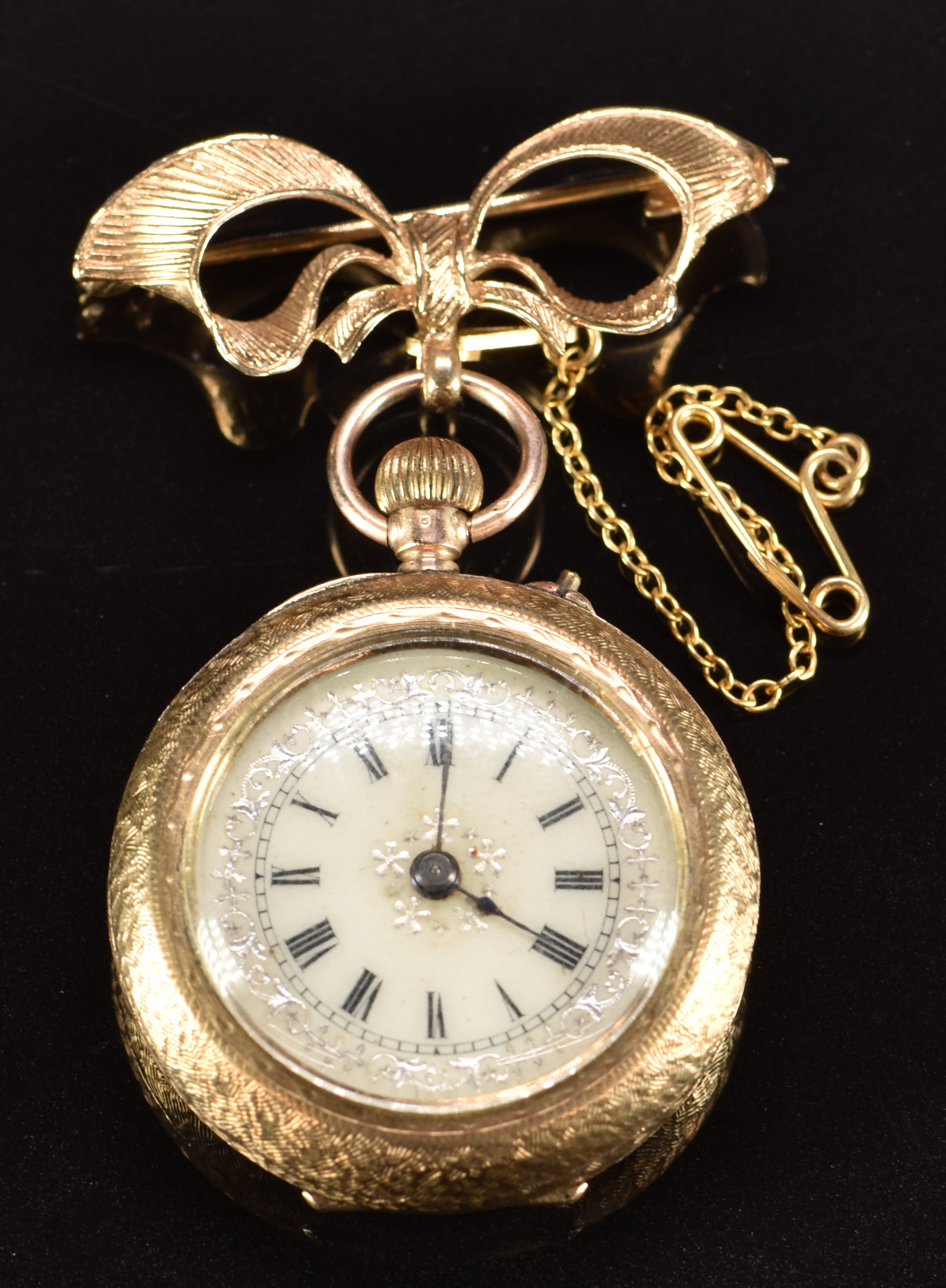 Swiss 9ct gold keyless winding open faced pocket watch with black Roman numerals, blued hands,